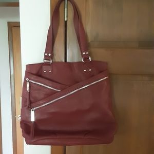 Perlina butter soft handbag.  Deep maroon color